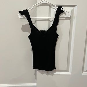 Black ribbed tank top with ruffle sleeves